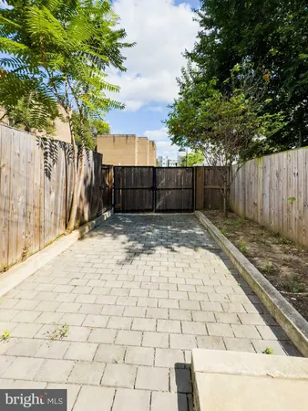 a view of a backyard of the house