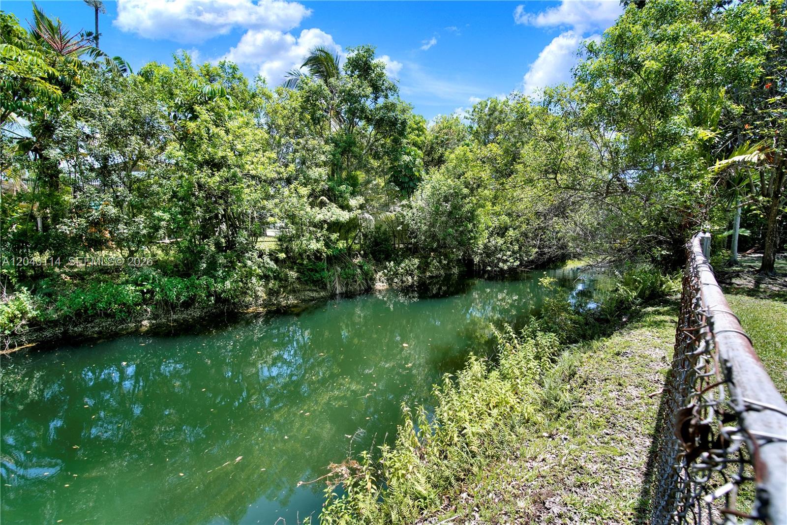 10435 Southwest 96th Street Miami, FL 33176 - Photo 41 of 44 Canal in the back of the property