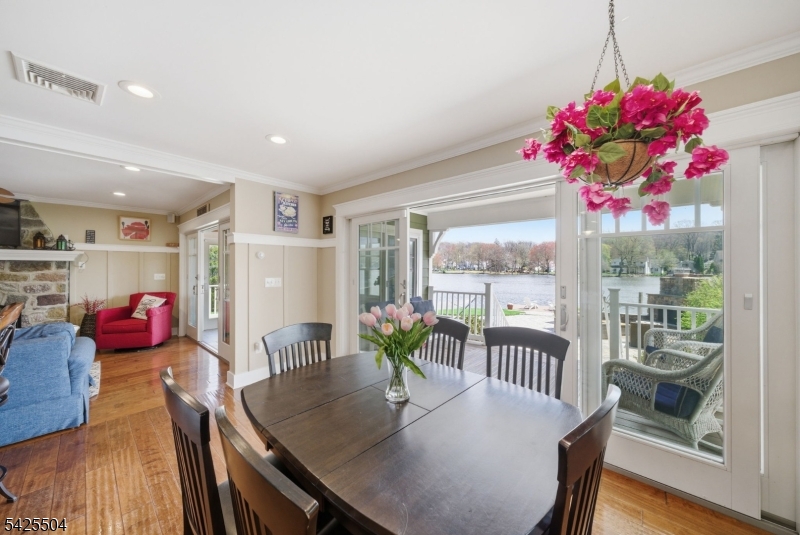 84 West Shore Road Denville, NJ 07834 - Photo 10 of 50 a dining room with furniture and wooden floor