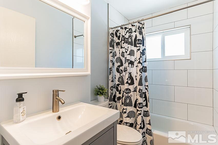 1999 Marlette Avenue Reno, NV 89503 - Photo 7 of 15 a bathroom with a sink and a mirror