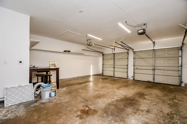 a view of a livingroom with furniture and a ceiling fan