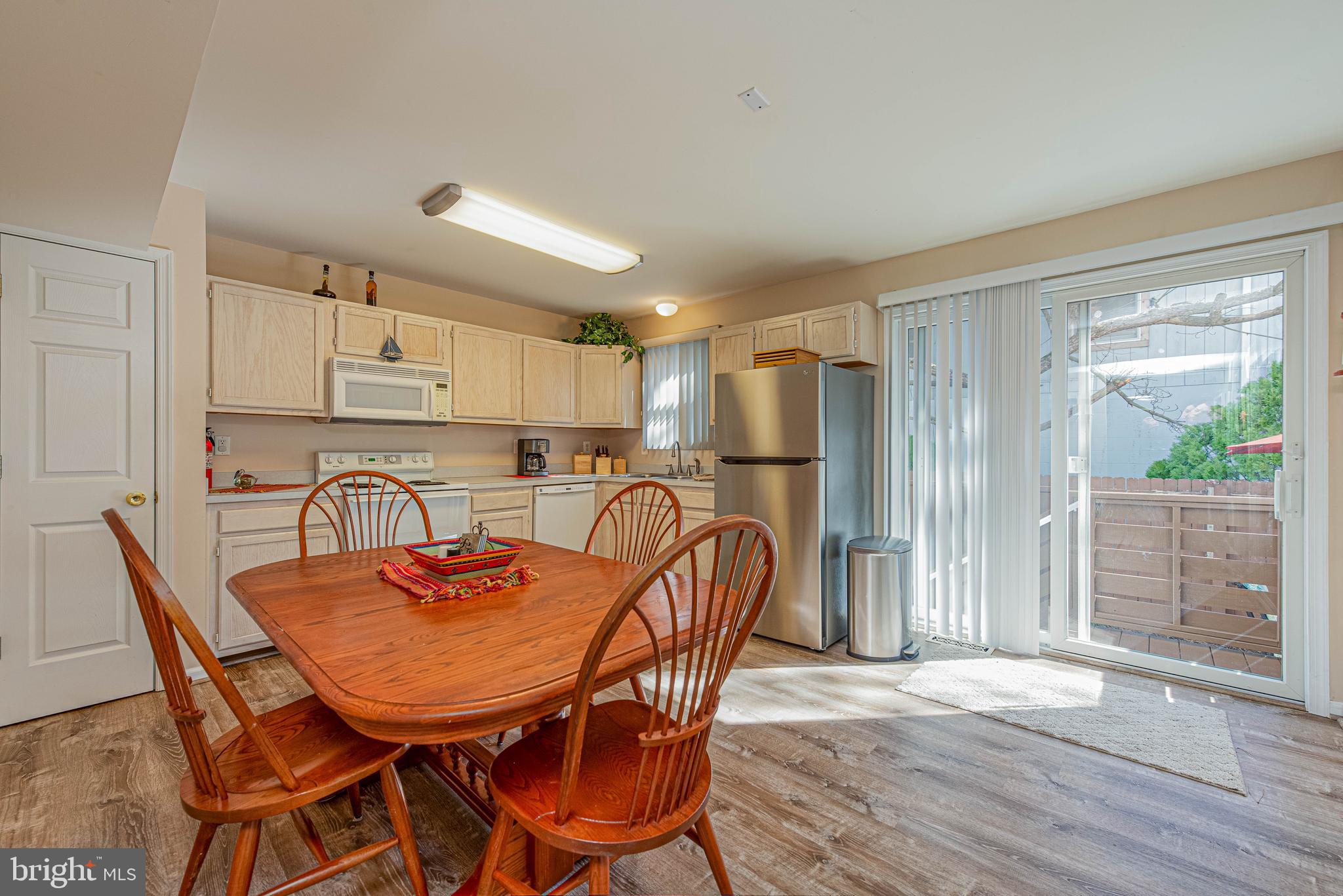 135 Captains Quarters Road Ocean City, MD 21842 - Photo 15 of 27 a view of a dining room with furniture
