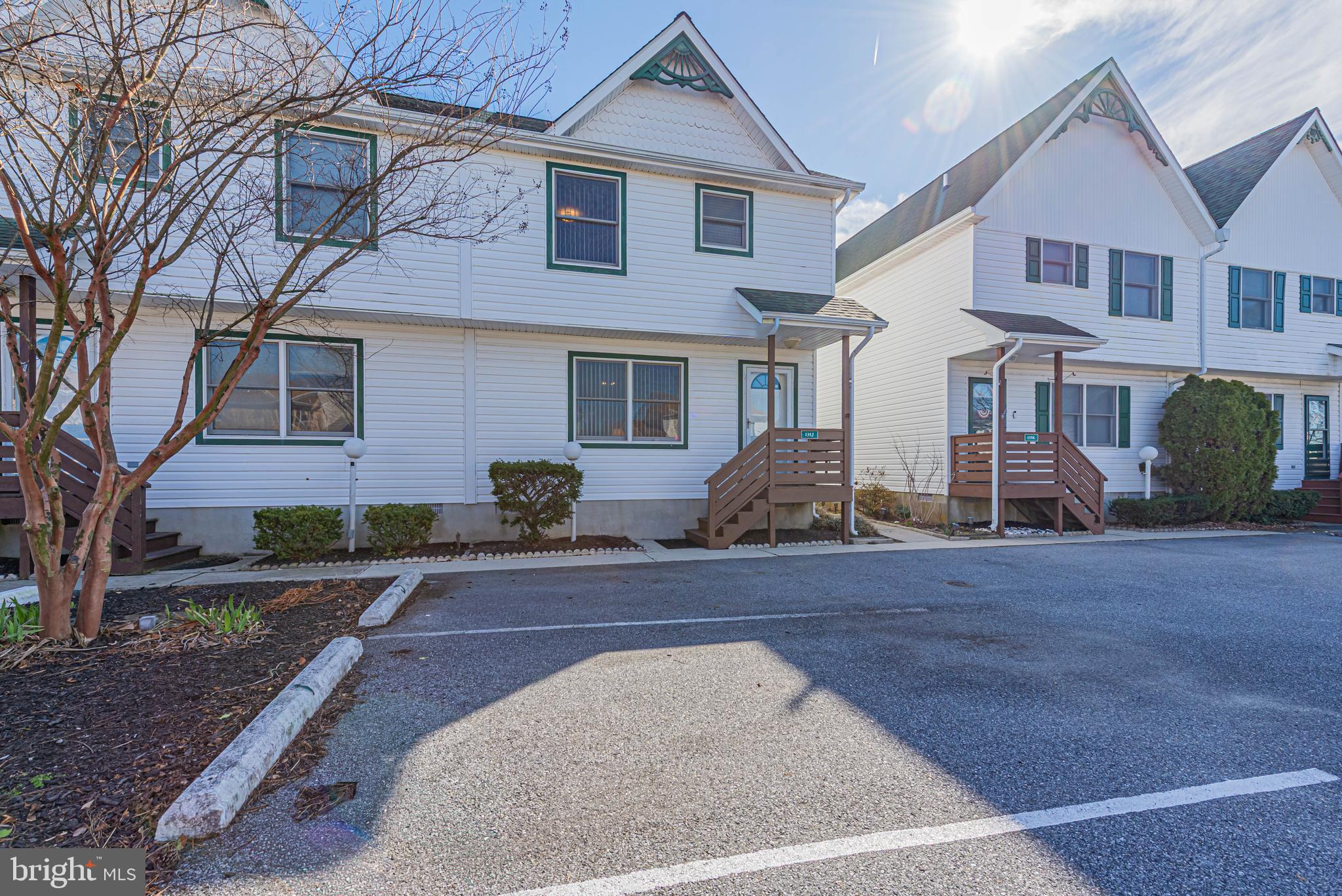 135 Captains Quarters Road Ocean City, MD 21842 - Photo 27 of 27 a front view of a house with yard