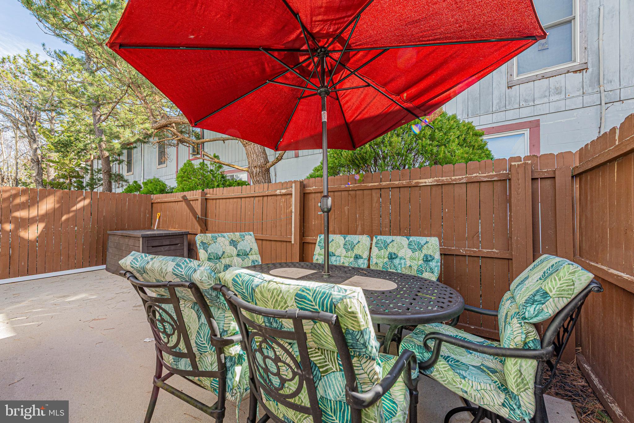 135 Captains Quarters Road Ocean City, MD 21842 - Photo 4 of 27 a view of a outdoor sitting area with furniture