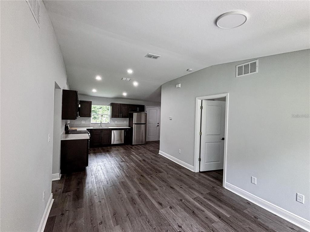 21 Locust Course Radiel Ocala, FL 34472 - Photo 2 of 8 a view of kitchen with refrigerator sink and stove