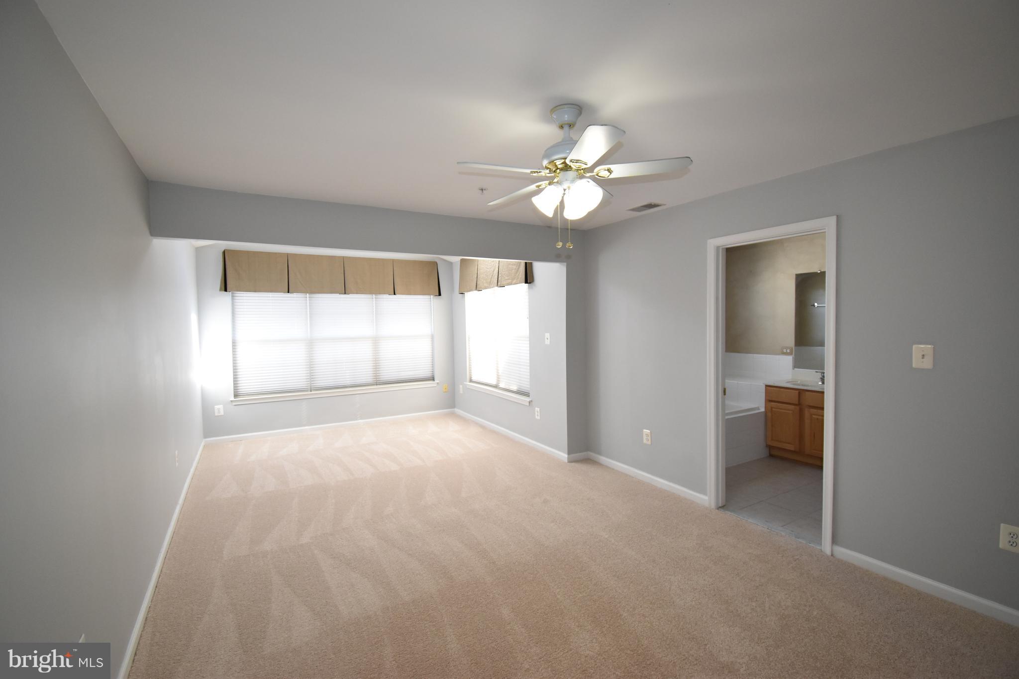 207 Canvasback Way Cambridge, MD 21613 - Photo 14 of 30 a view of an empty room with a window