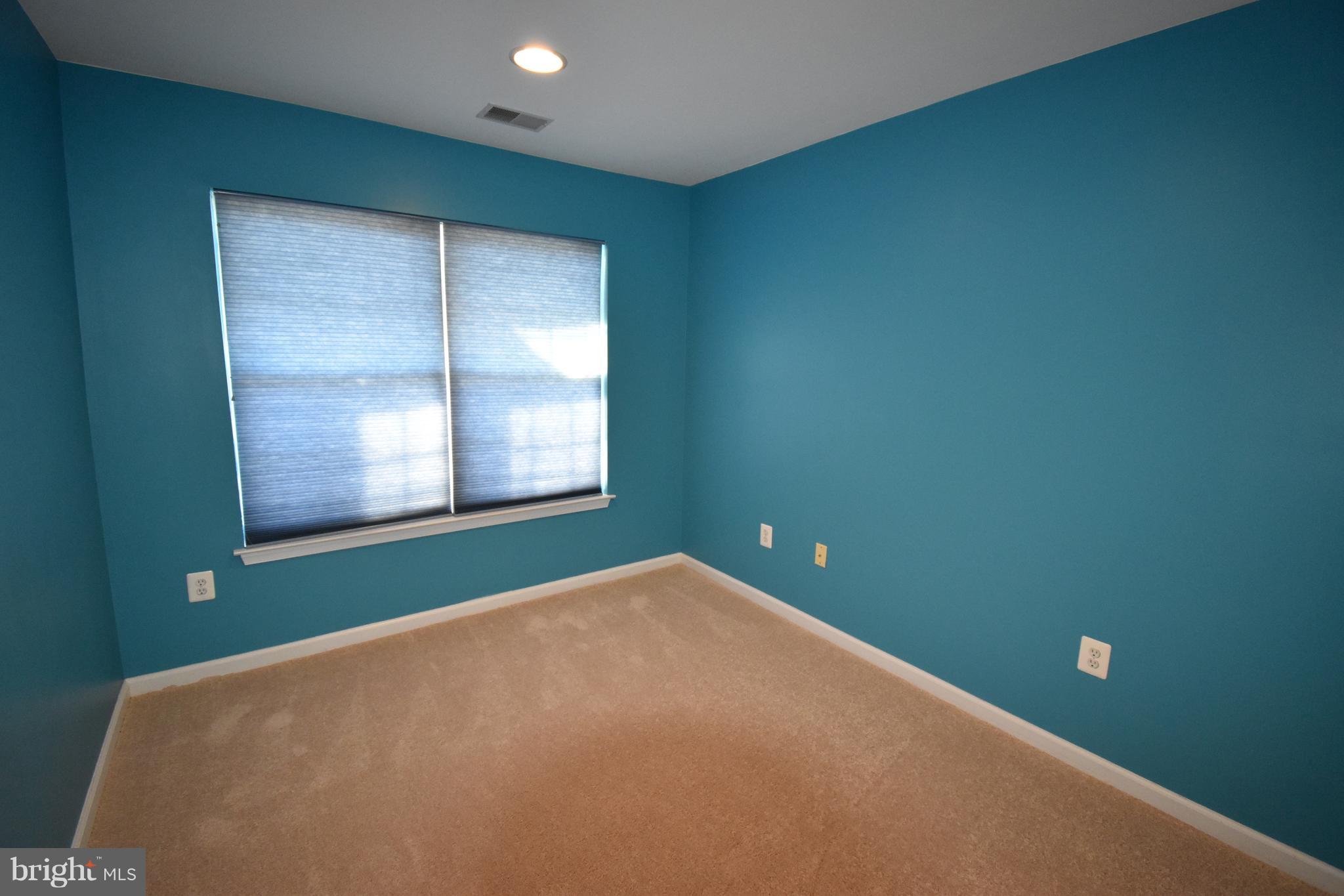 207 Canvasback Way Cambridge, MD 21613 - Photo 21 of 30 a view of an empty room with a window