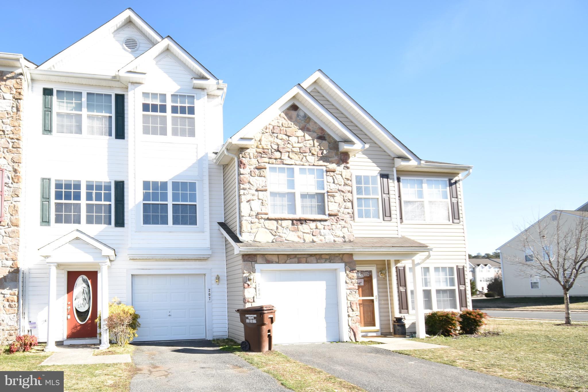 207 Canvasback Way Cambridge, MD 21613 - Photo 27 of 30 a view of a building with a outdoor space