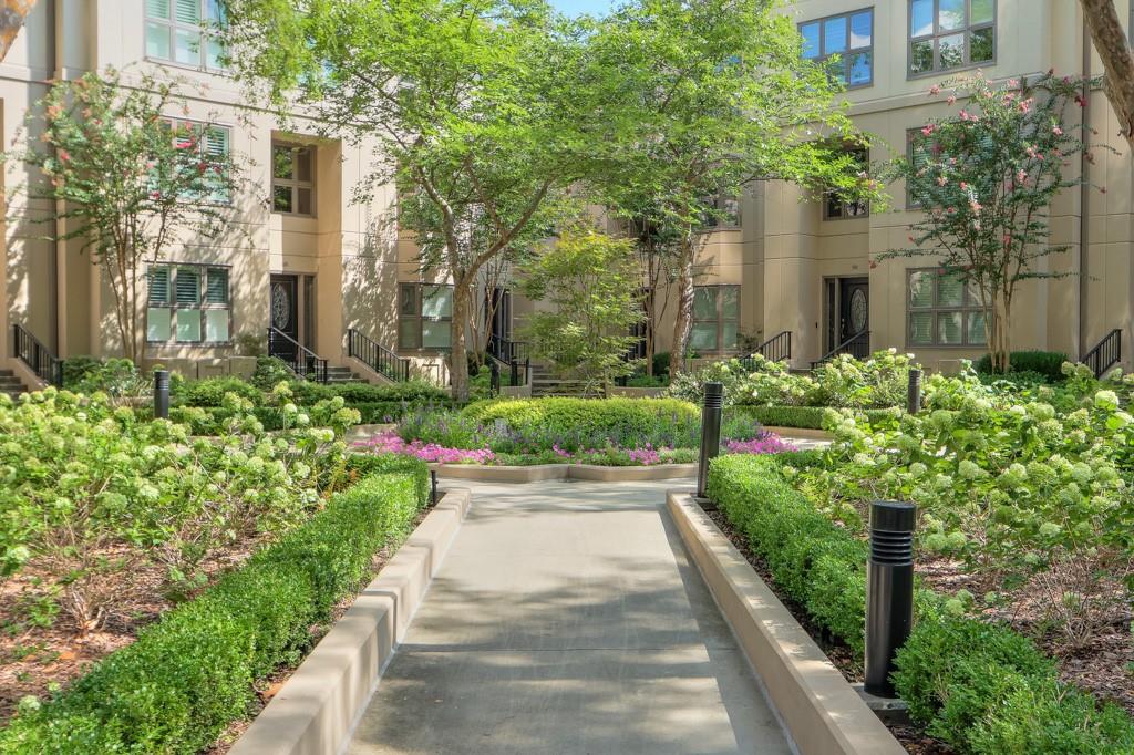 3475 Oak Valley Road Northeast, Unit 530 Atlanta, GA 30326 - Photo 2 of 37 a view of a pathway with house on both side