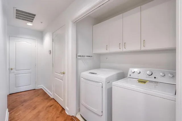 a view of small space with wooden floor