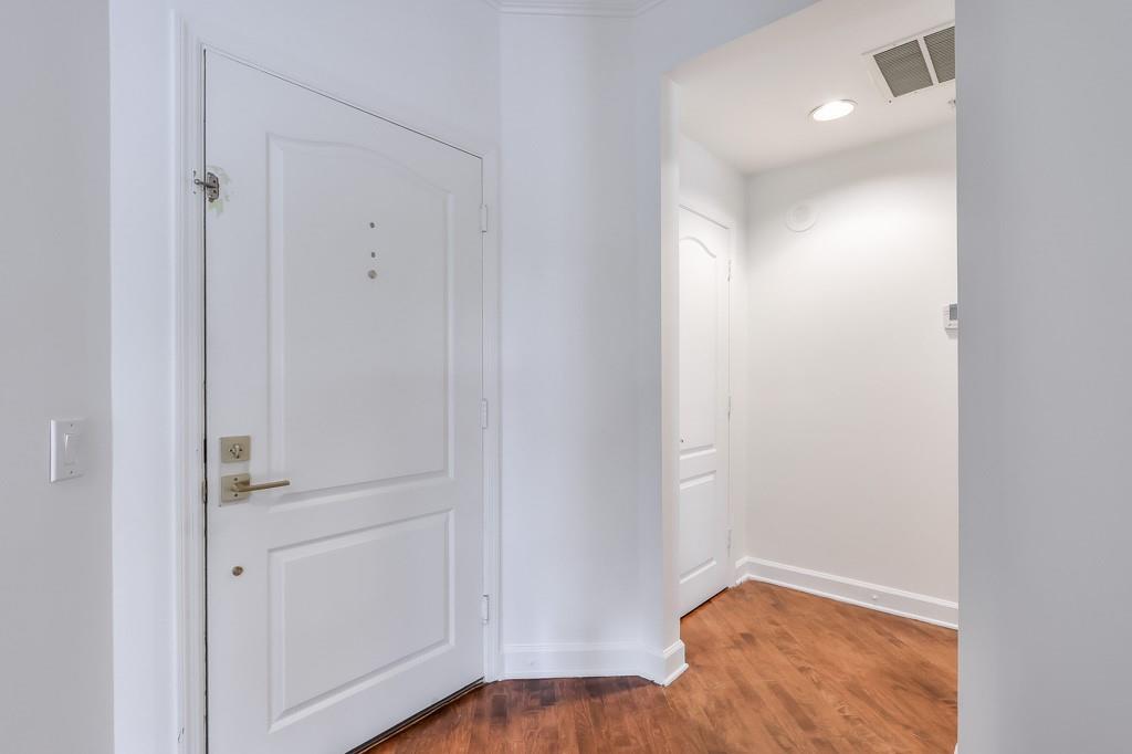 3475 Oak Valley Road Northeast, Unit 530 Atlanta, GA 30326 - Photo 33 of 37 a view of small space with wooden floor