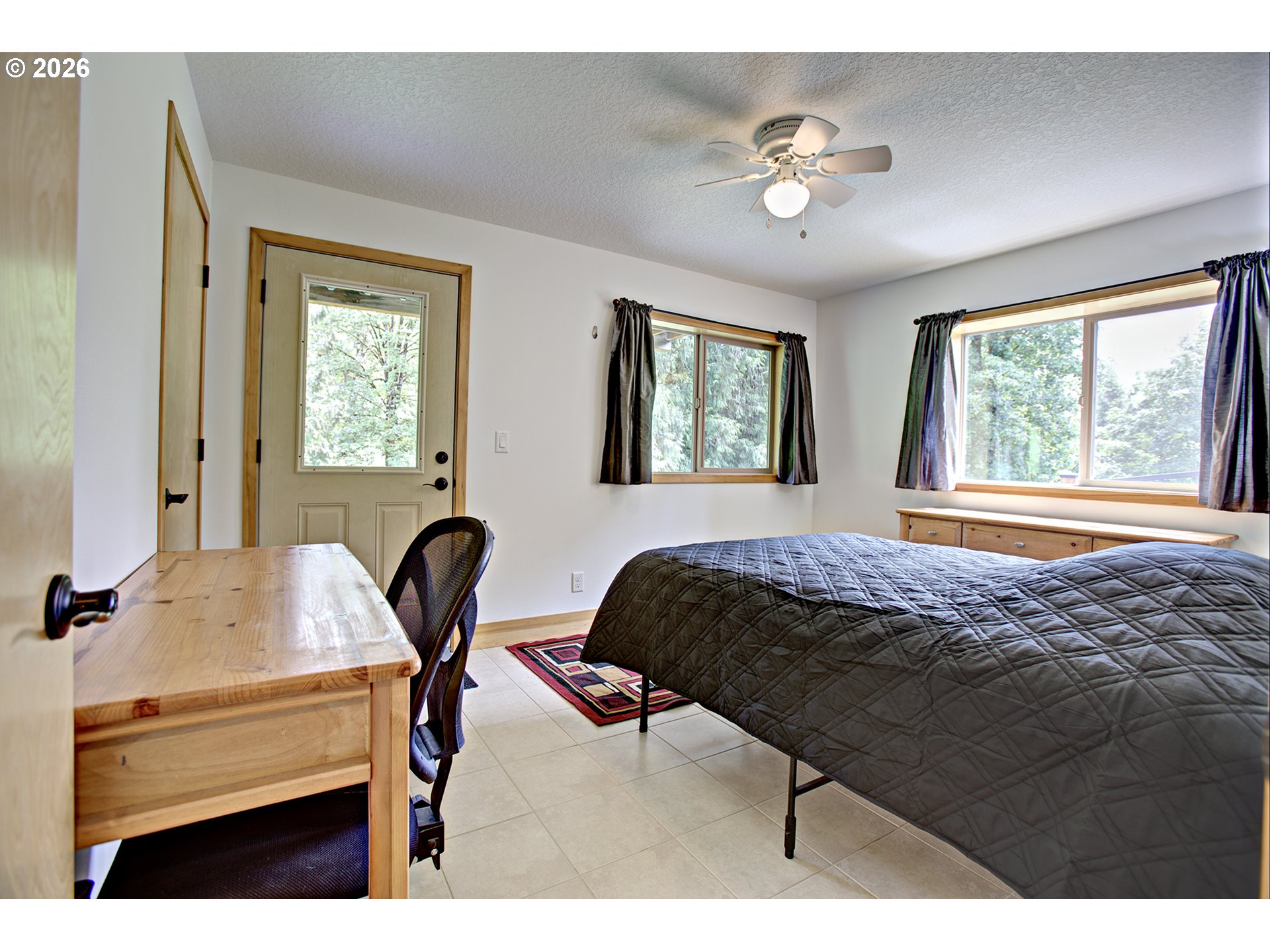 60300 Rays Way St. Helens, OR 97051 - Photo 31 of 41 a bedroom with a bed and windows