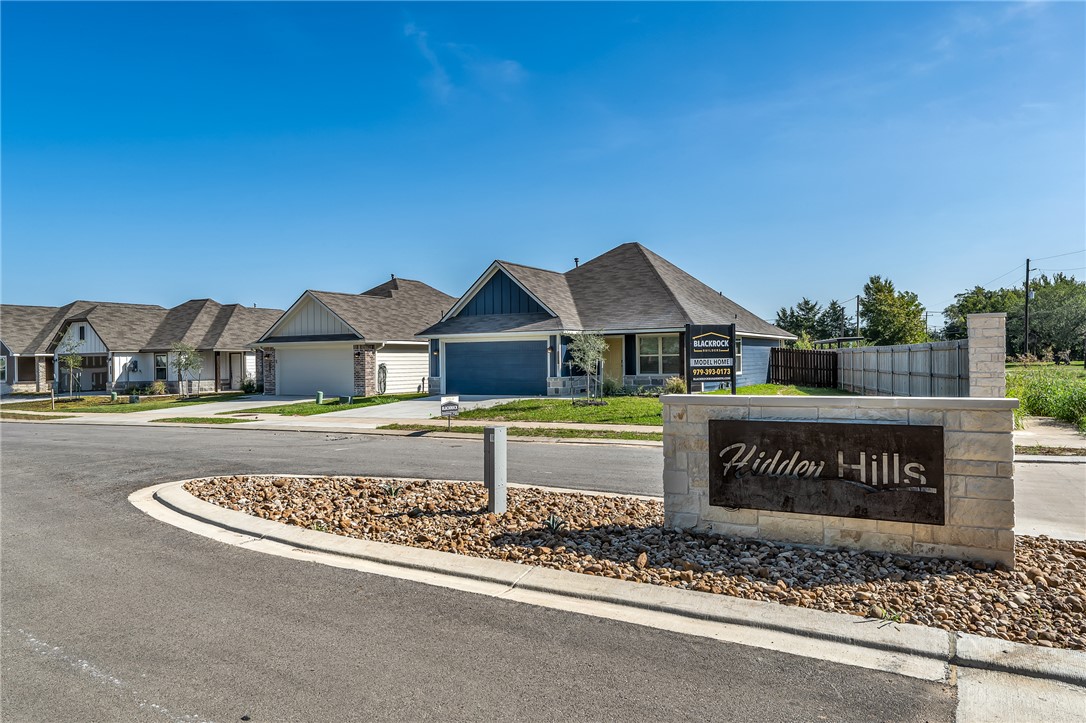 1220 High Street Navasota, TX 77868 - Photo 15 of 17 a front view of a house with a garden