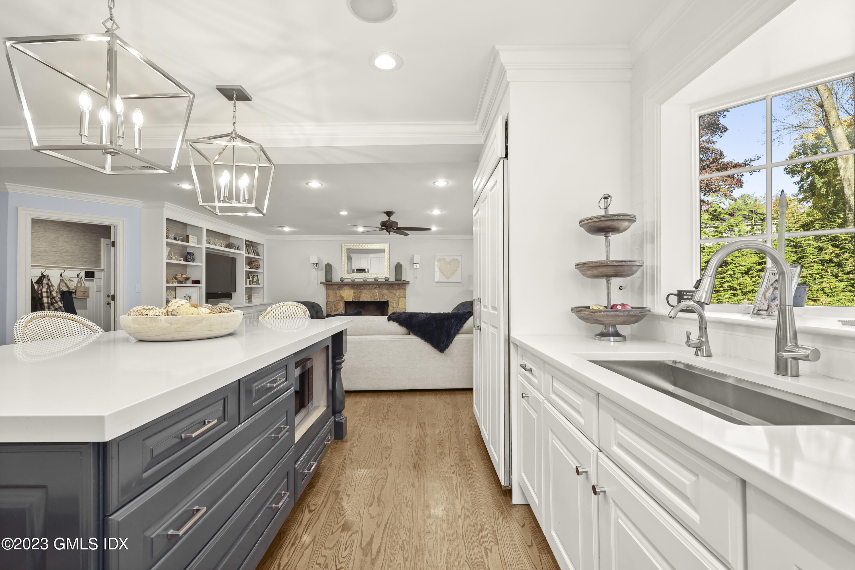 14 Rainbow Drive Riverside, CT 06878 - Photo 9 of 29 a large white kitchen with a large counter top appliances and cabinets