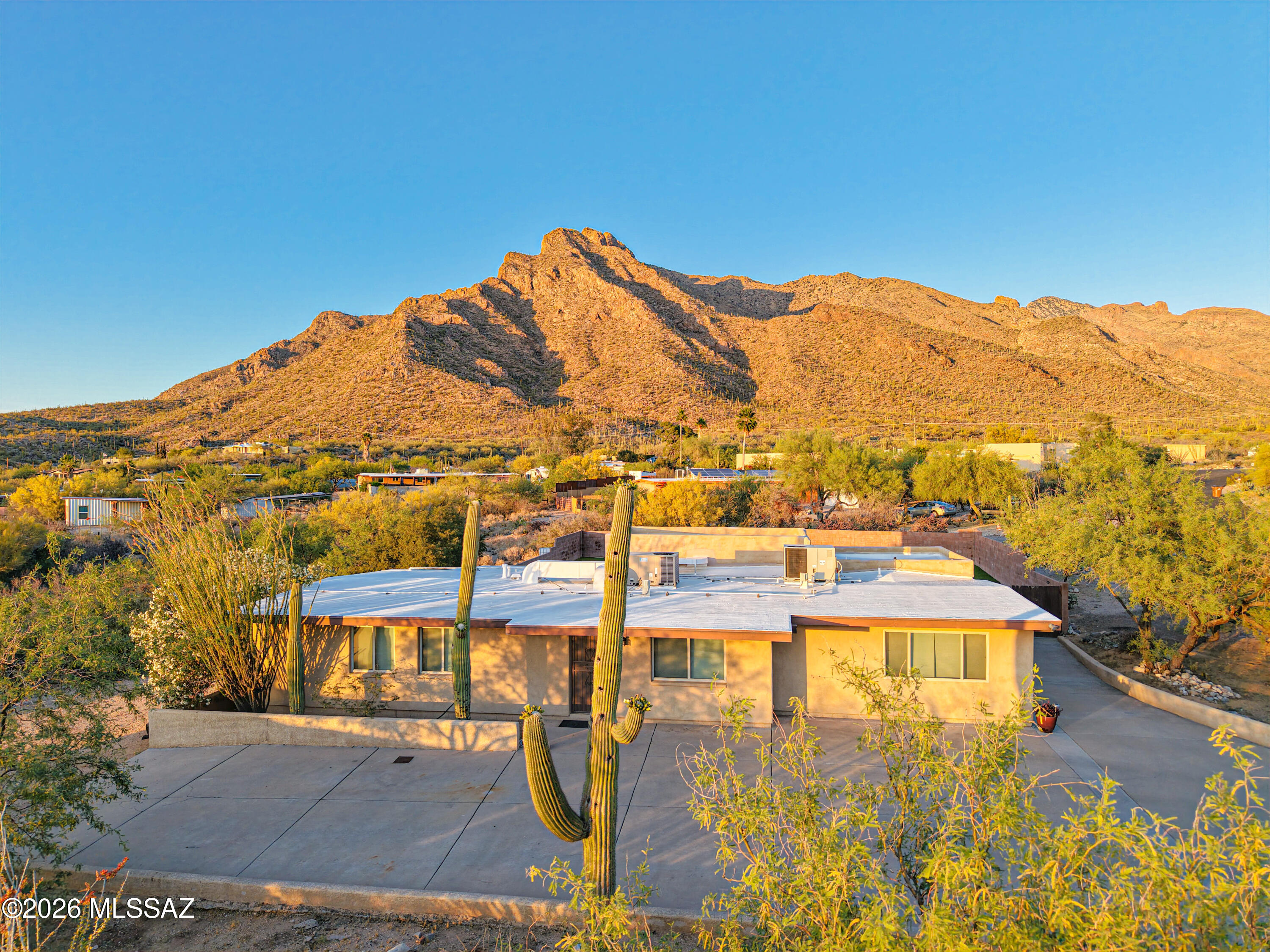 545 East Rancho Catalina Place Tucson, AZ 85704 - Photo 1 of 13 a view of a swimming pool with an ocean view