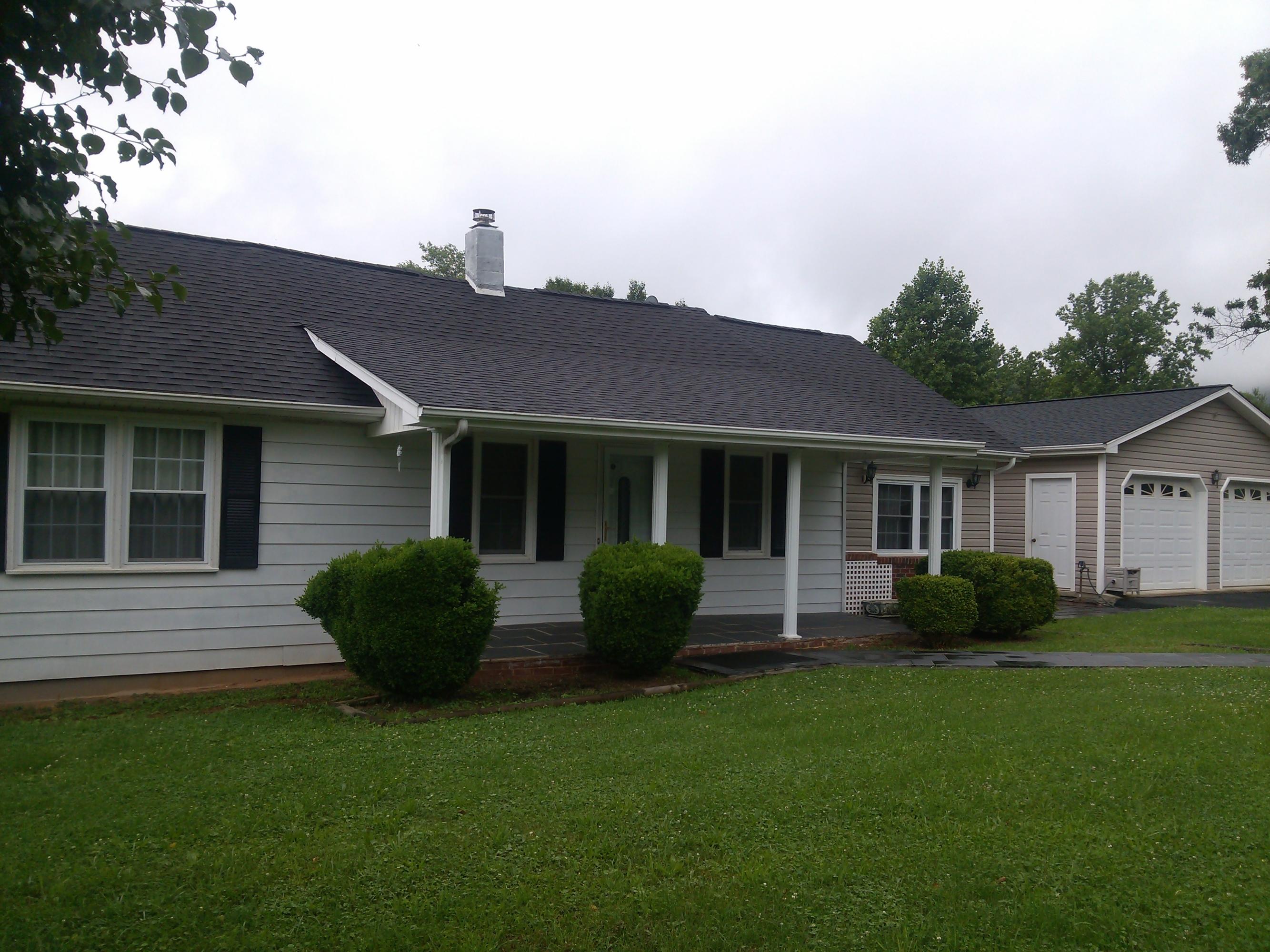 325 Sawmill Road Ferrum, VA 24088 - Photo 12 of 19 a front view of a house with a garden