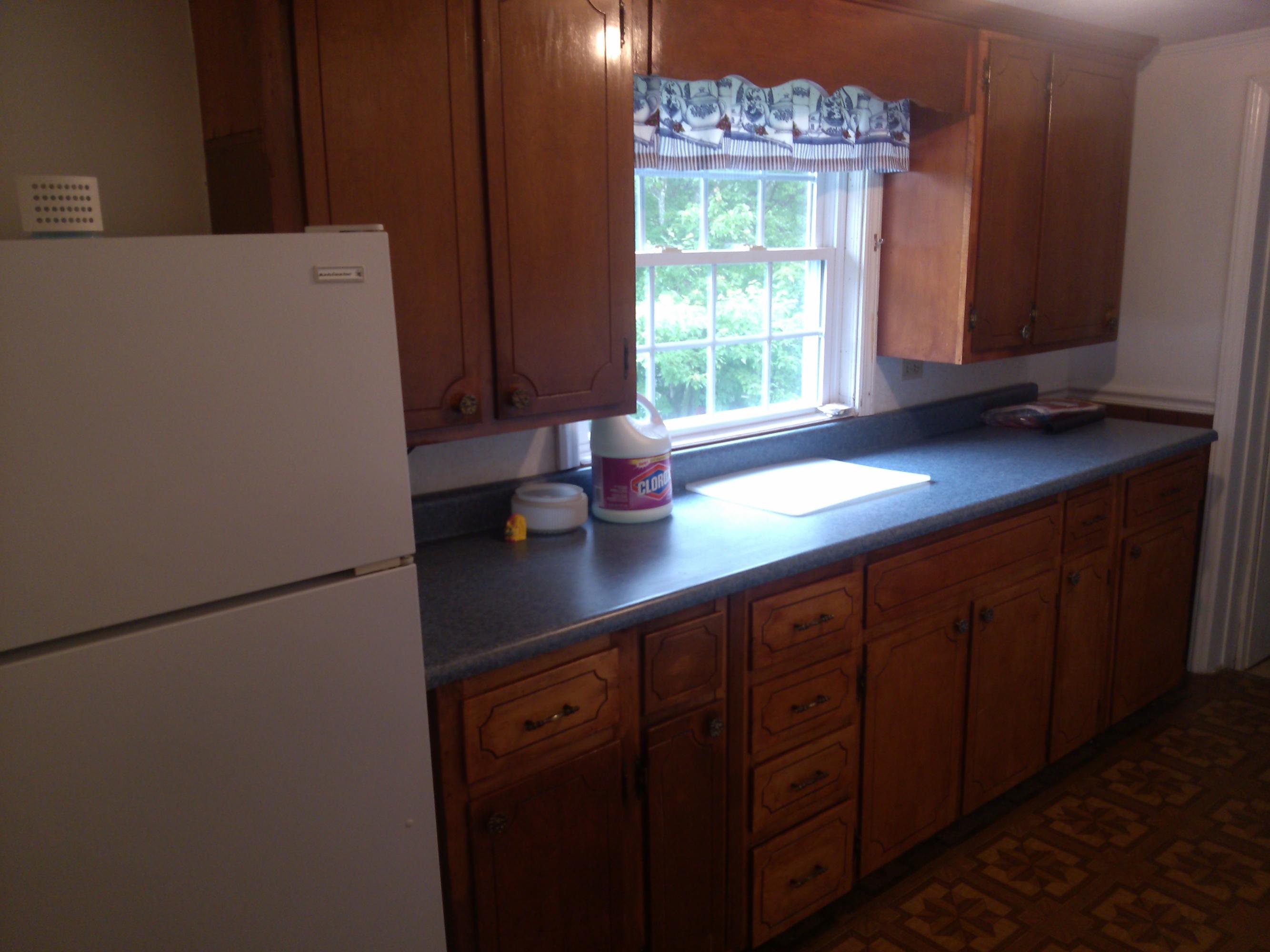 325 Sawmill Road Ferrum, VA 24088 - Photo 16 of 19 a kitchen with a refrigerator and a window