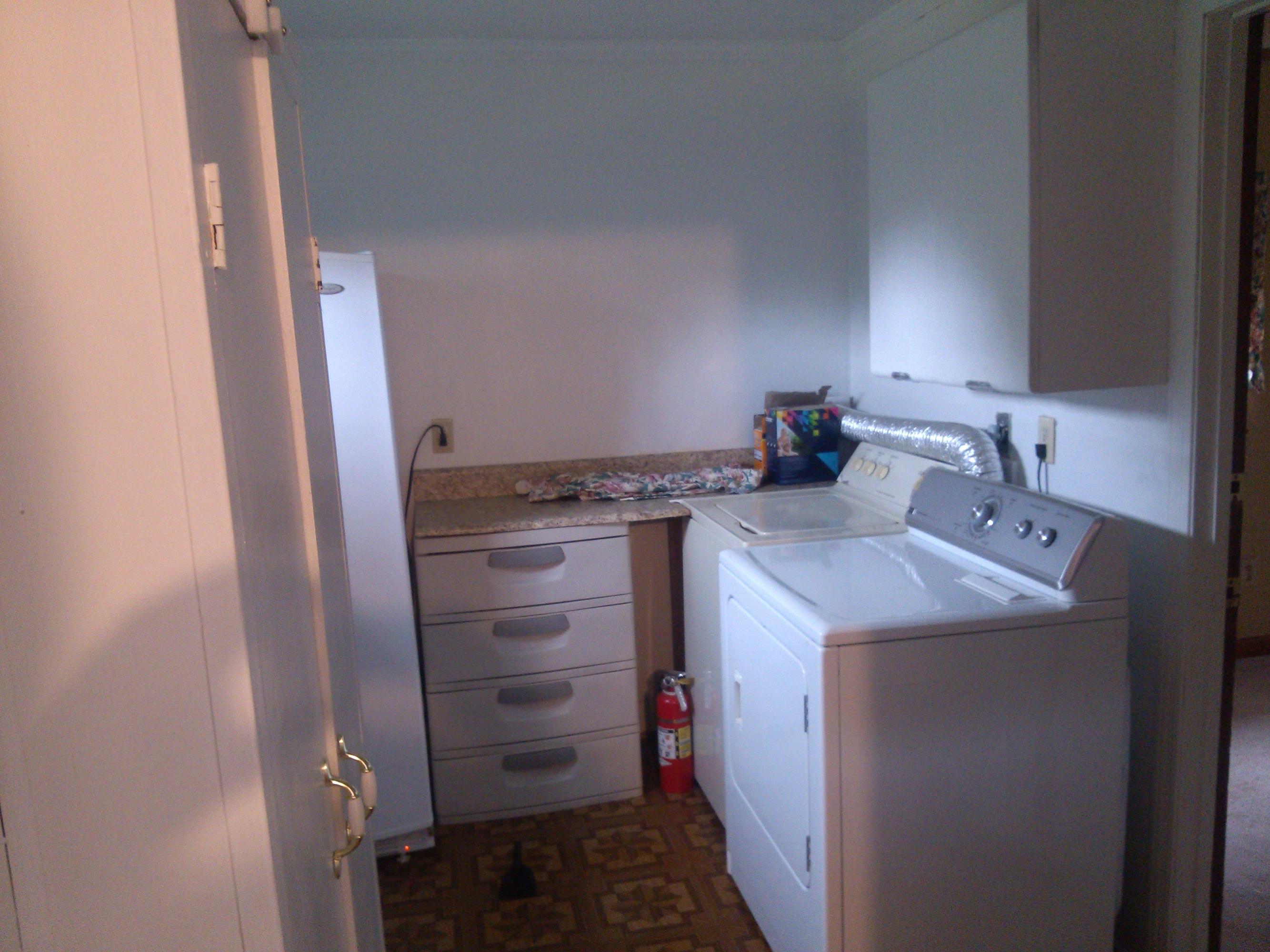 325 Sawmill Road Ferrum, VA 24088 - Photo 17 of 19 a utility room with cabinets washer and dryer