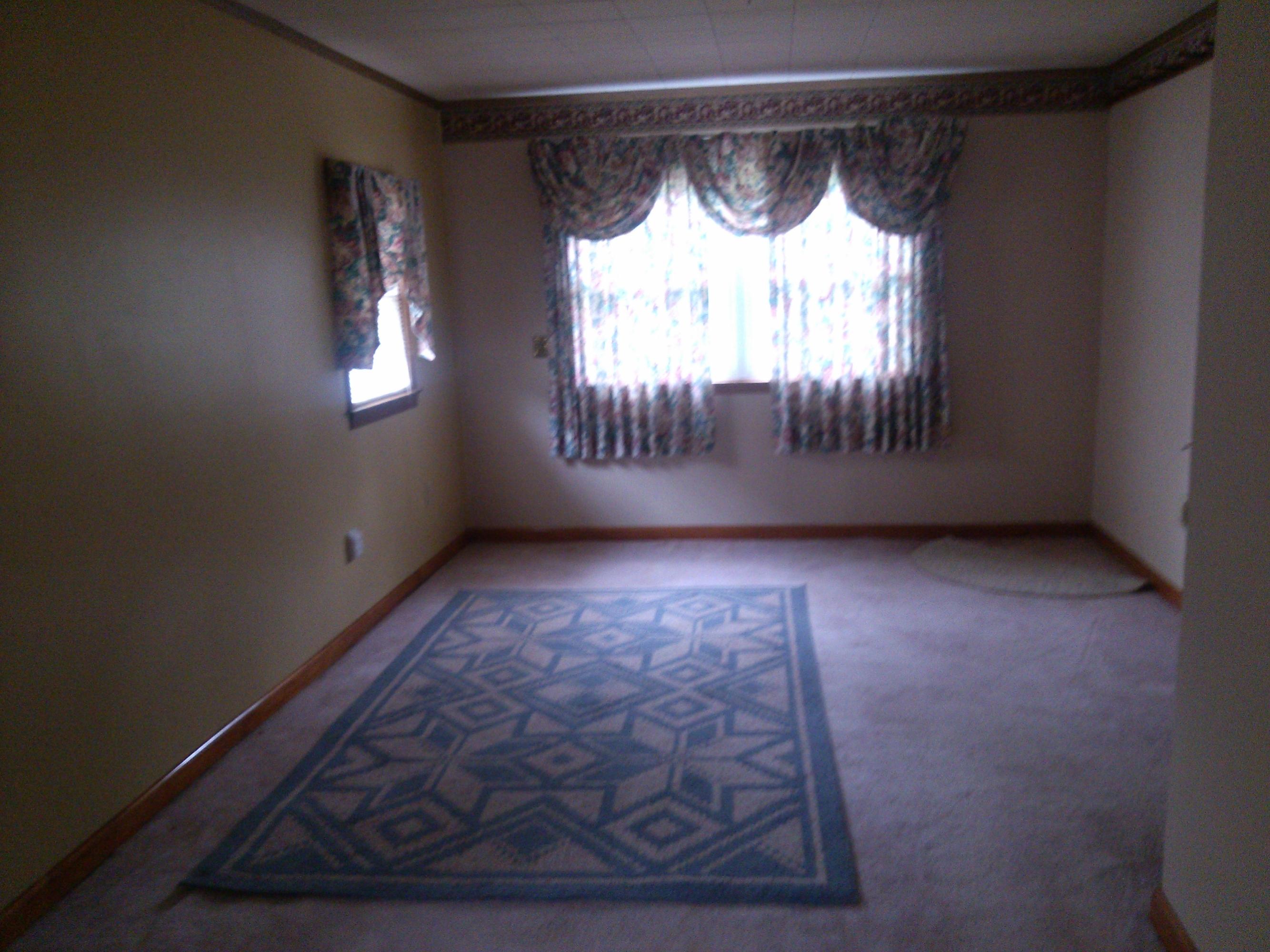 325 Sawmill Road Ferrum, VA 24088 - Photo 8 of 19 a view of an empty room with a window