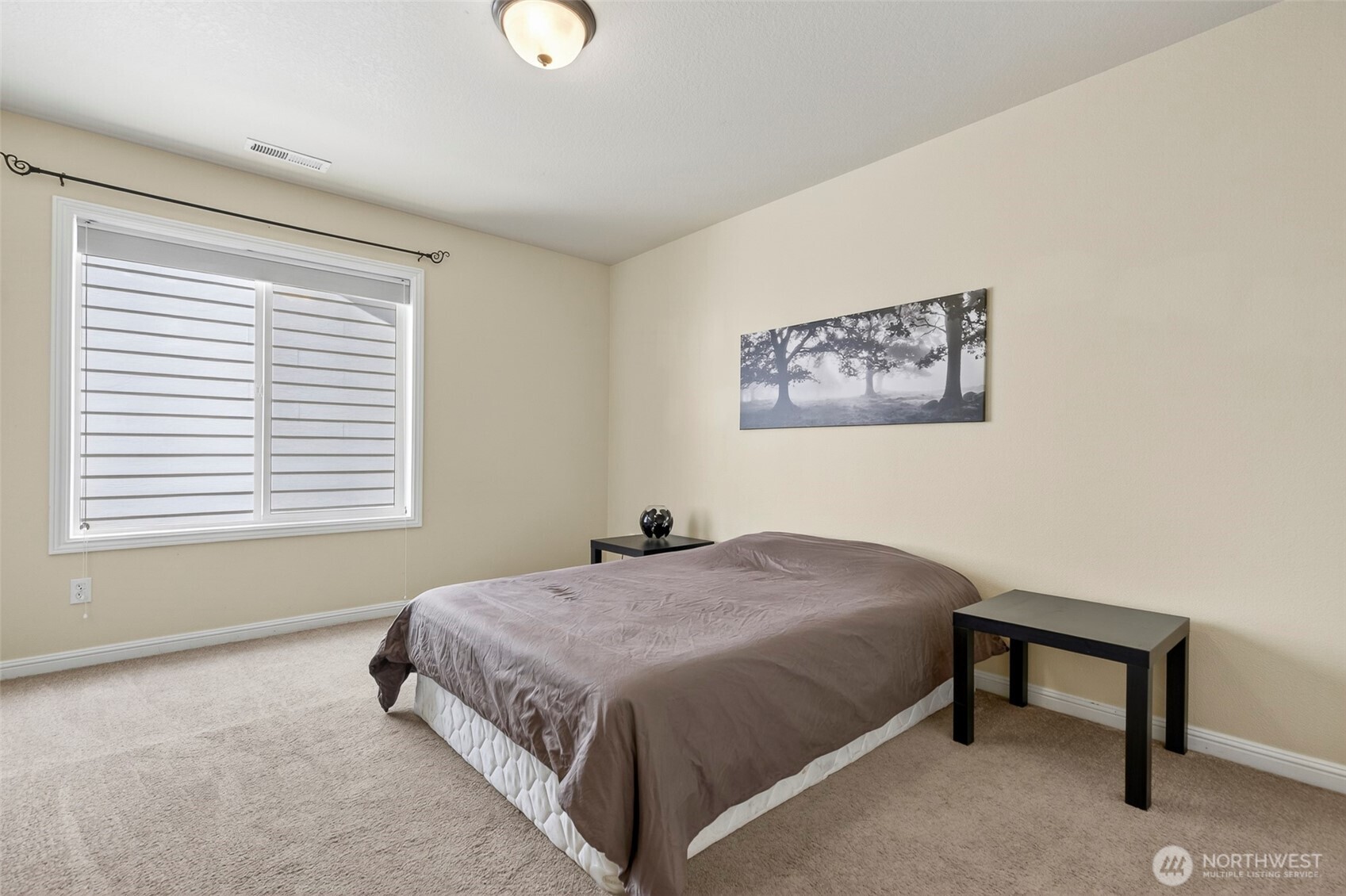 16715 Northeast 5th Street Vancouver, WA 98684 - Photo 18 of 34 a bedroom with a bed and a window