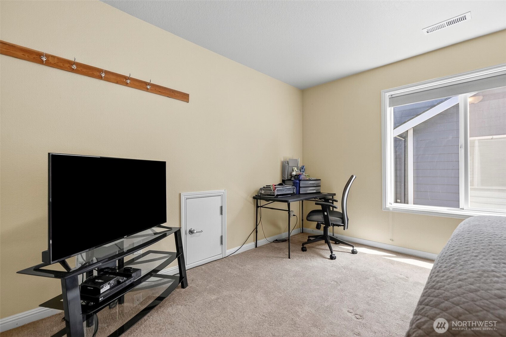 16715 Northeast 5th Street Vancouver, WA 98684 - Photo 22 of 34 a view of a livingroom with furniture and a flat screen tv