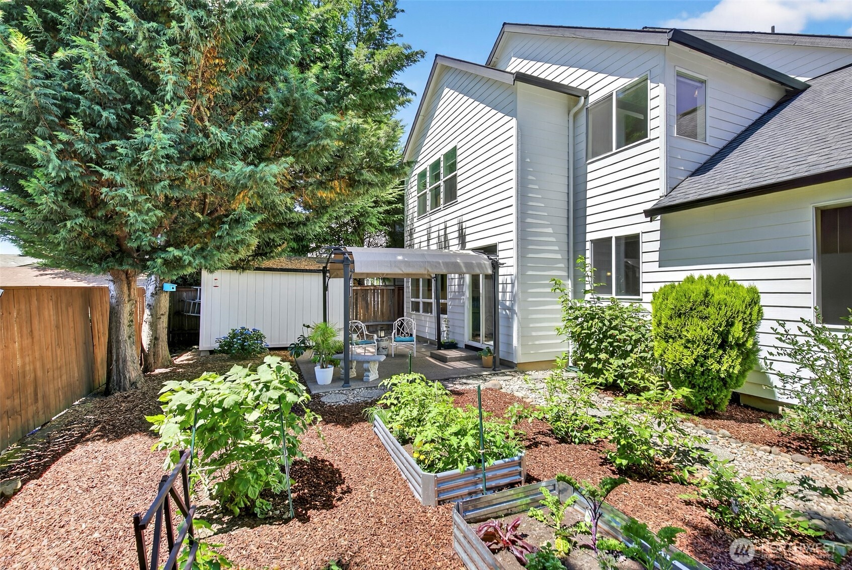 16715 Northeast 5th Street Vancouver, WA 98684 - Photo 25 of 34 a front view of a house with garden