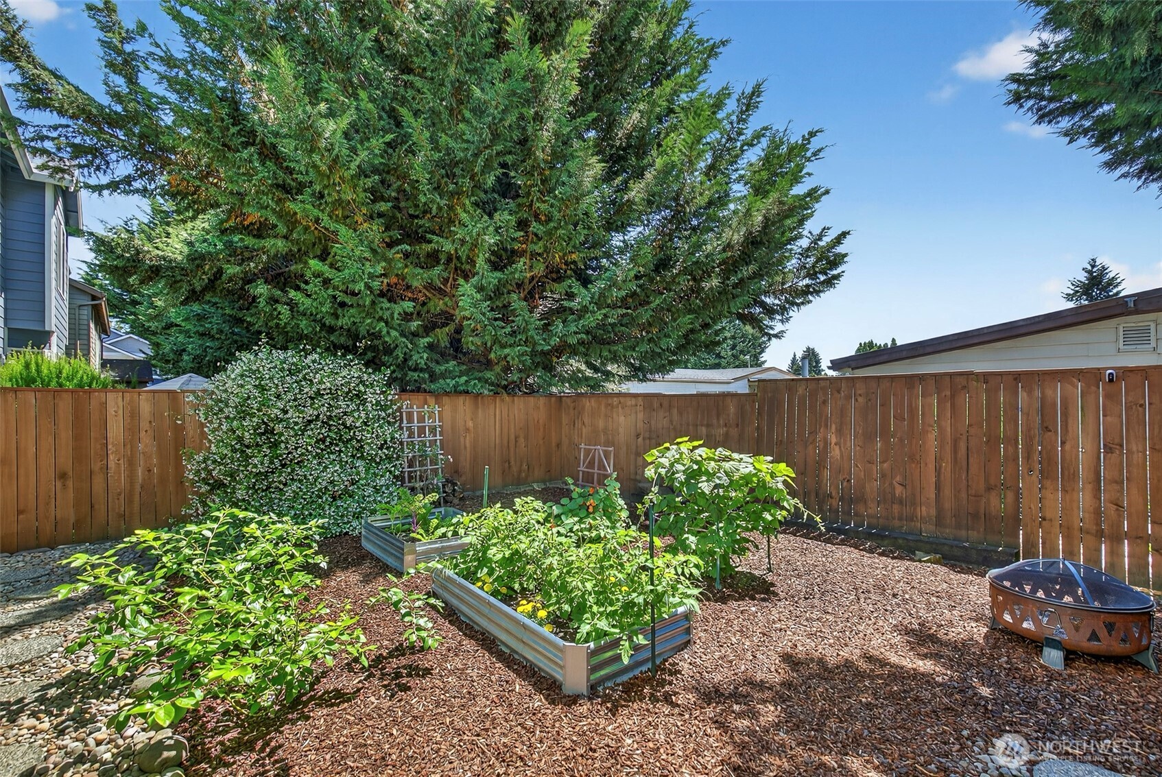 16715 Northeast 5th Street Vancouver, WA 98684 - Photo 31 of 34 a wooden fence with some plants