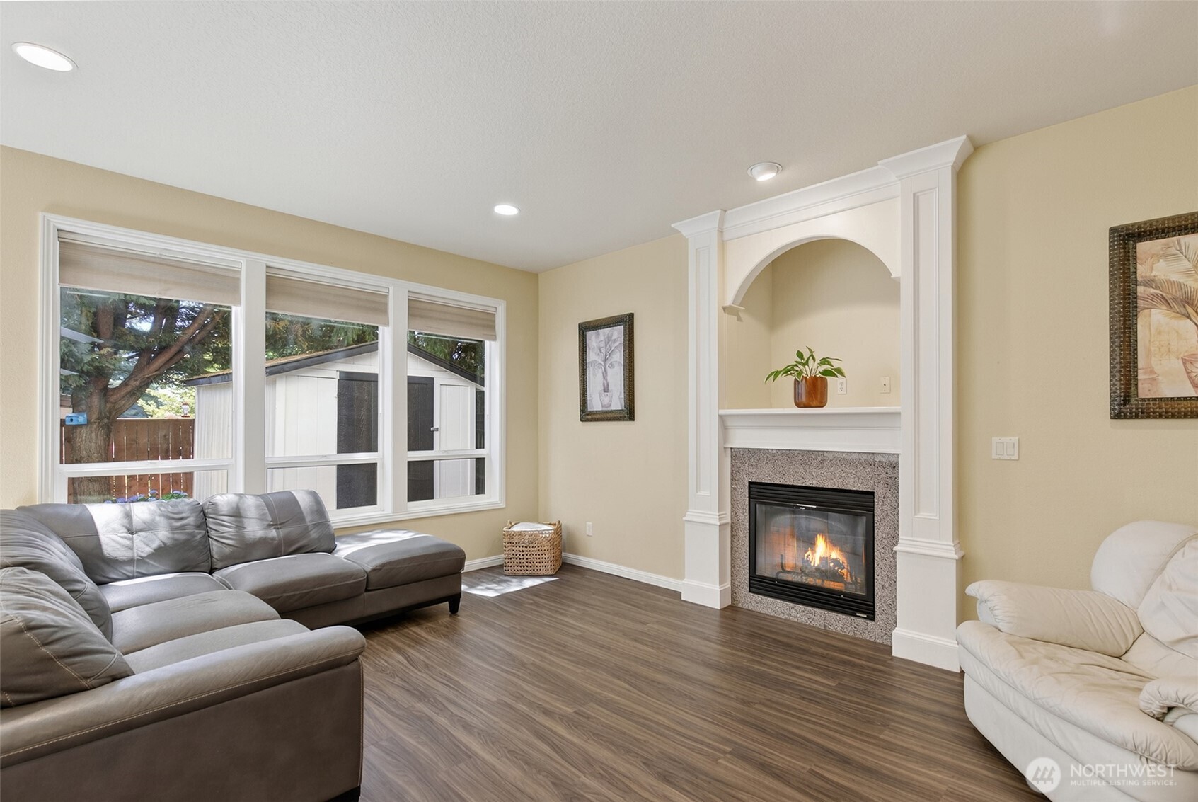 16715 Northeast 5th Street Vancouver, WA 98684 - Photo 9 of 34 a living room with furniture and a fireplace