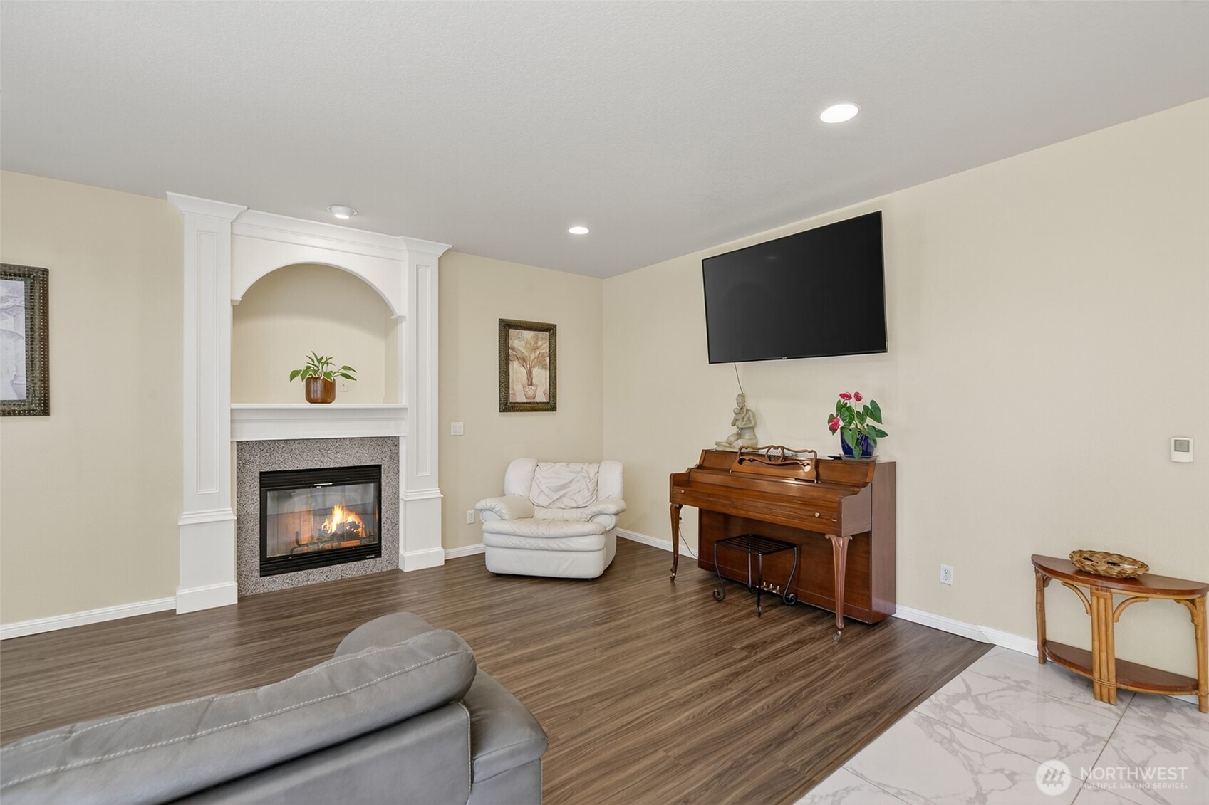 16715 Northeast 5th Street Vancouver, WA 98684 - Photo 10 of 34 a living room with furniture and a fireplace