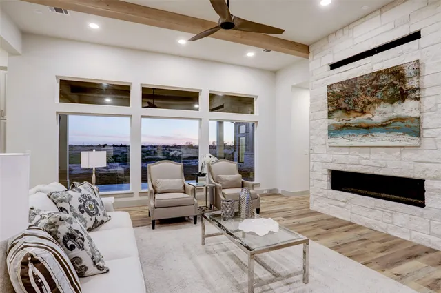 a living room with furniture or couch and a fireplace
