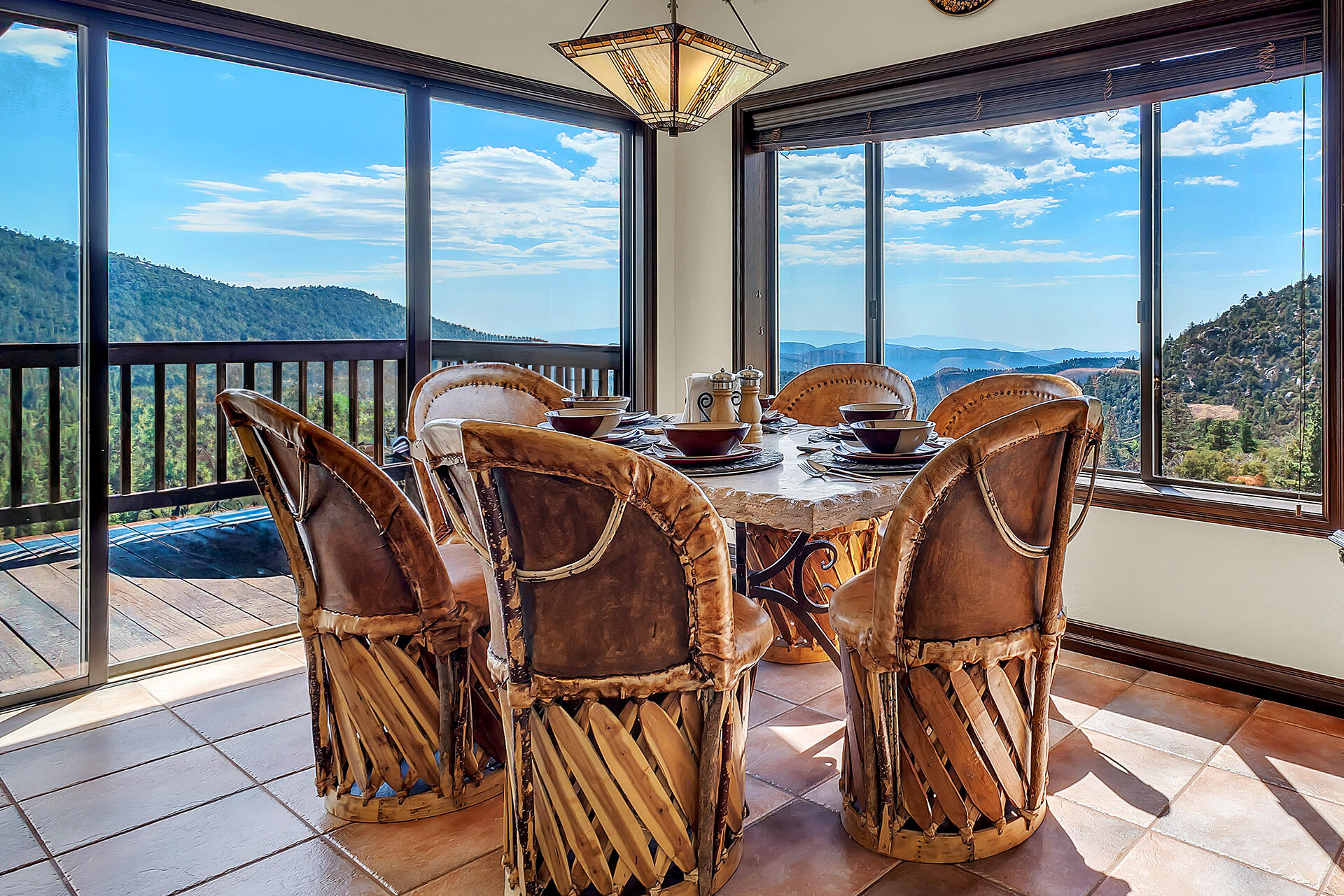 24740 Pioneer Road Idyllwild, CA 92549 - Photo 18 of 59 a view of a dining room with furniture window and outside view