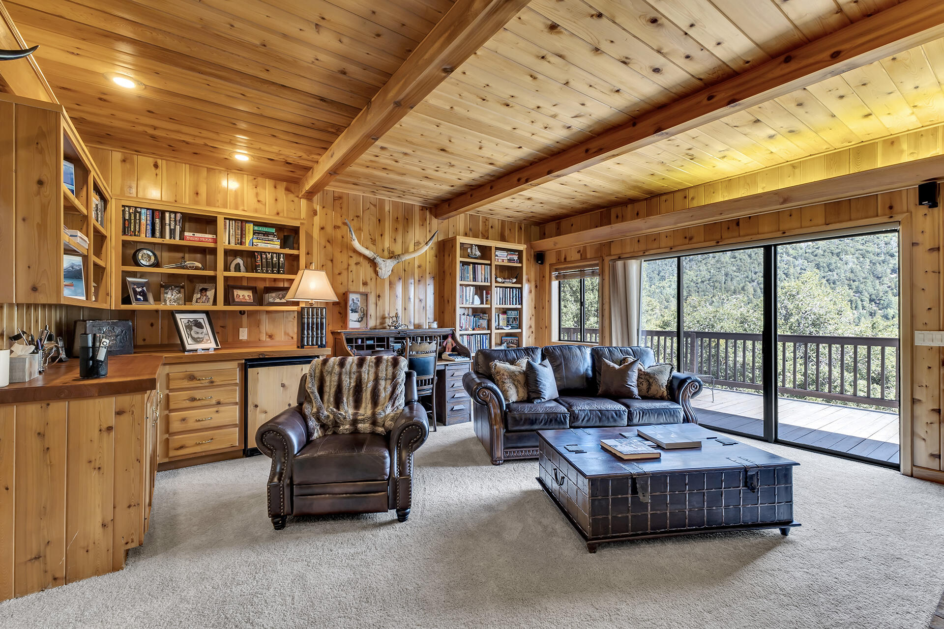24740 Pioneer Road Idyllwild, CA 92549 - Photo 21 of 59 a living room with furniture and a chandelier
