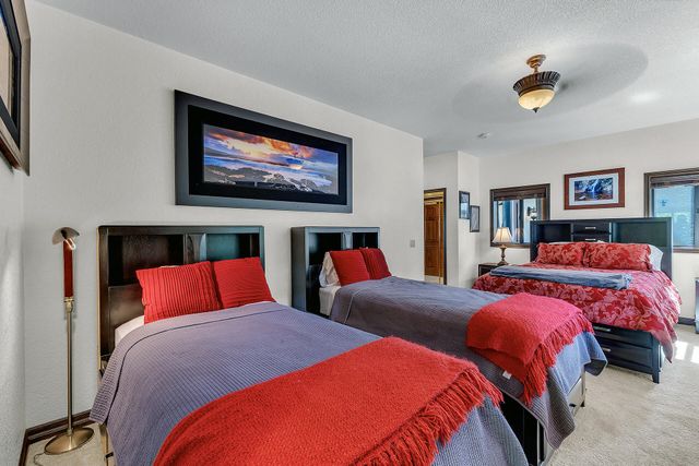 a bathroom with a sink and a large mirror