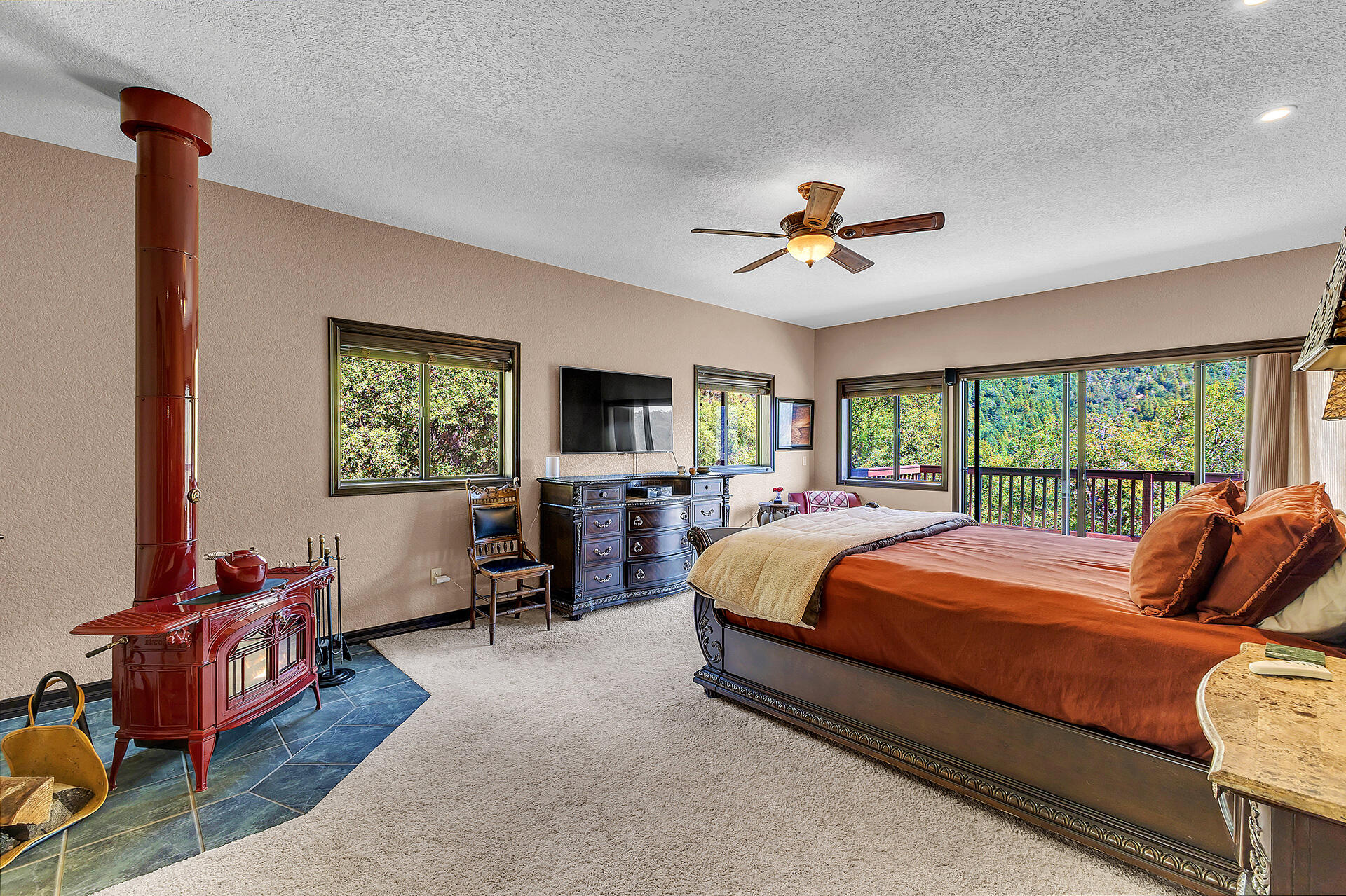 24740 Pioneer Road Idyllwild, CA 92549 - Photo 25 of 59 a bed room with a bed and a chair