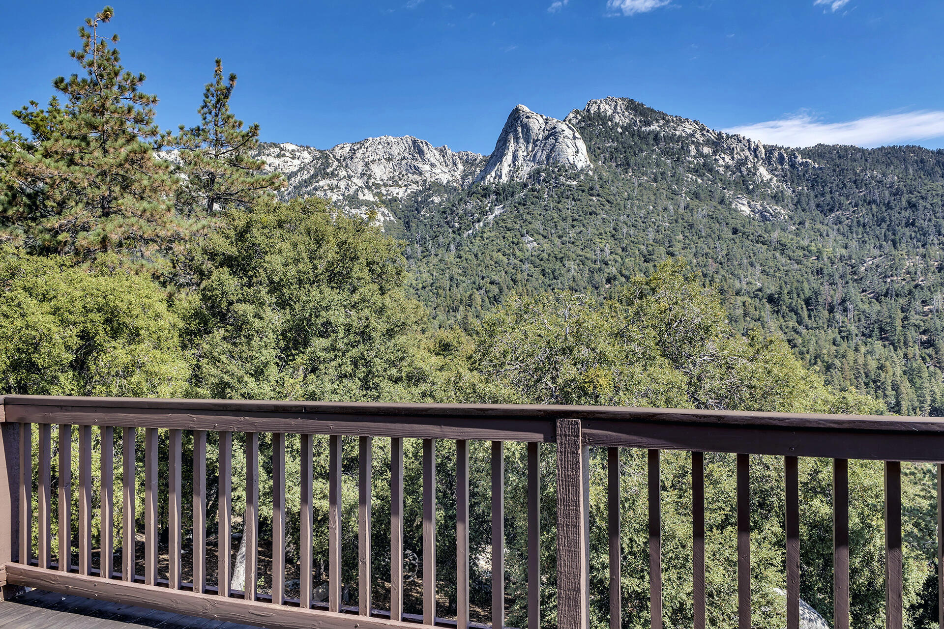 24740 Pioneer Road Idyllwild, CA 92549 - Photo 31 of 59 a balcony with an outdoor space