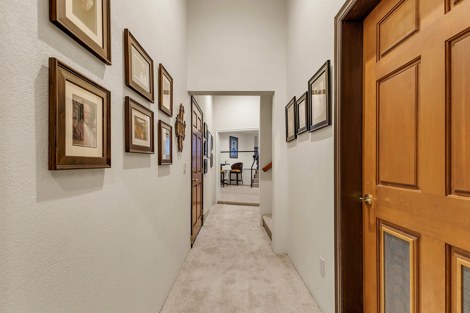 24740 Pioneer Road Idyllwild, CA 92549 - Photo 40 of 59 a view of a hallway with a glass door and furniture