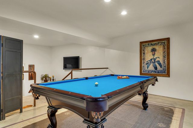 an empty room with ceiling fan