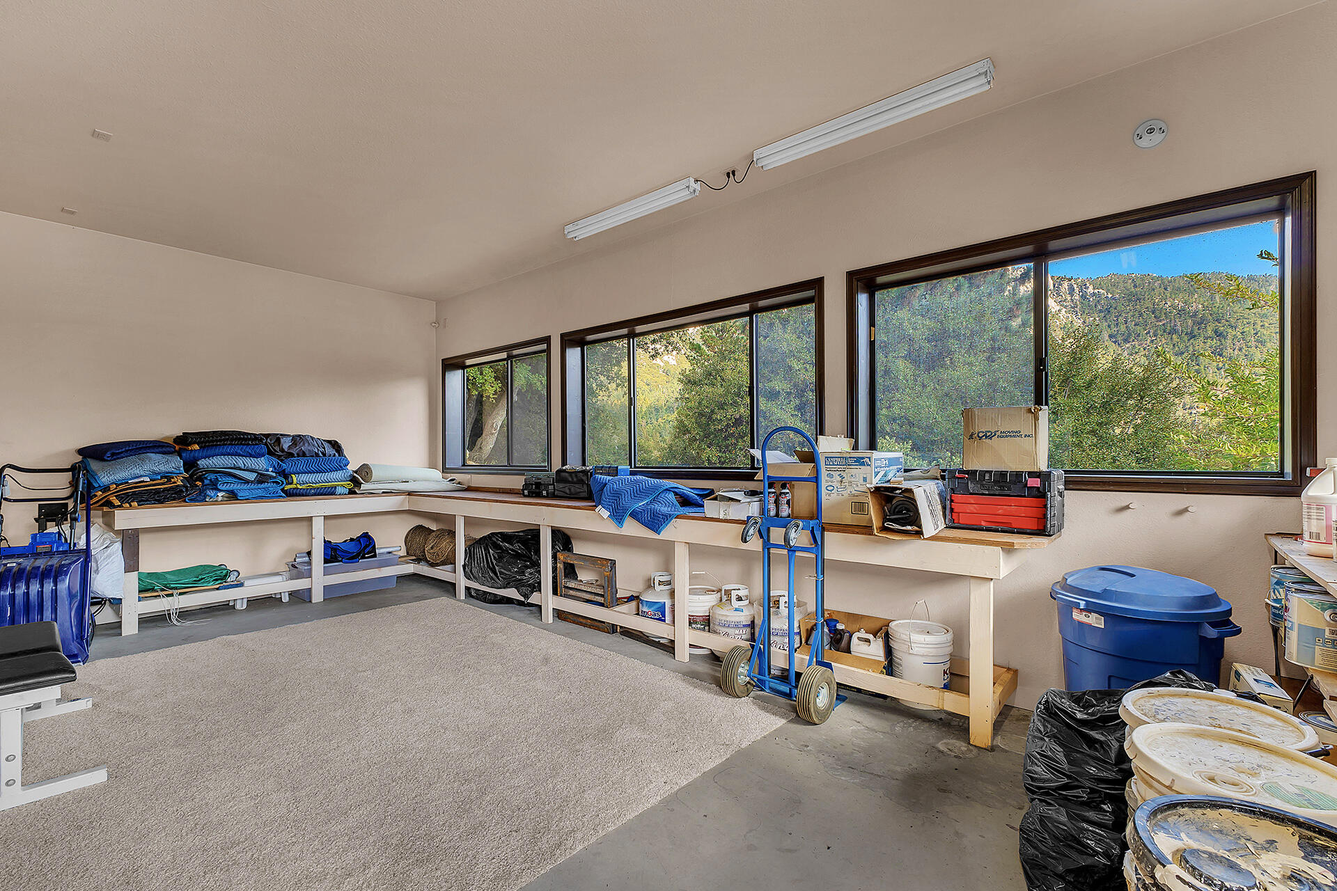 24740 Pioneer Road Idyllwild, CA 92549 - Photo 50 of 59 a living room with furniture and a large window