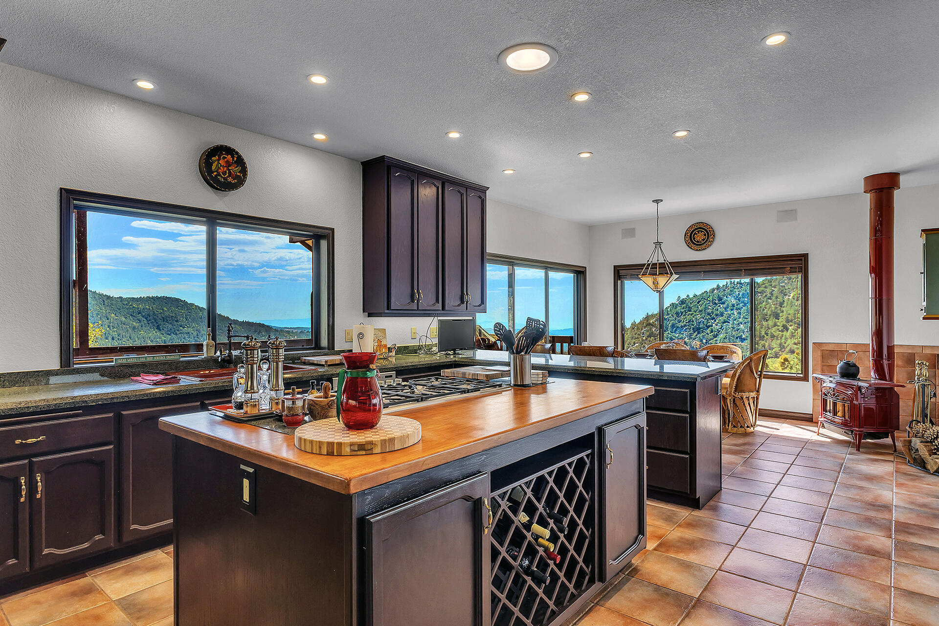 24740 Pioneer Road Idyllwild, CA 92549 - Photo 9 of 59 a kitchen with lots of counter top space