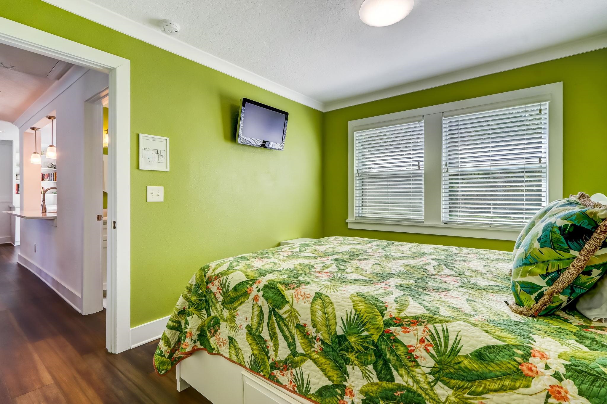 28 Atlantic Avenue St. Augustine, FL 32084 - Photo 18 of 23 a bed sitting in a bedroom next to a window