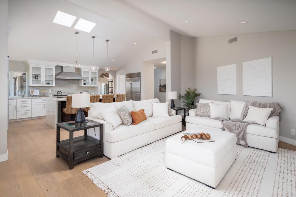 5002 El Acebo Rancho Santa Fe, CA 92067 - Photo 14 of 55 a living room with furniture and a chandelier