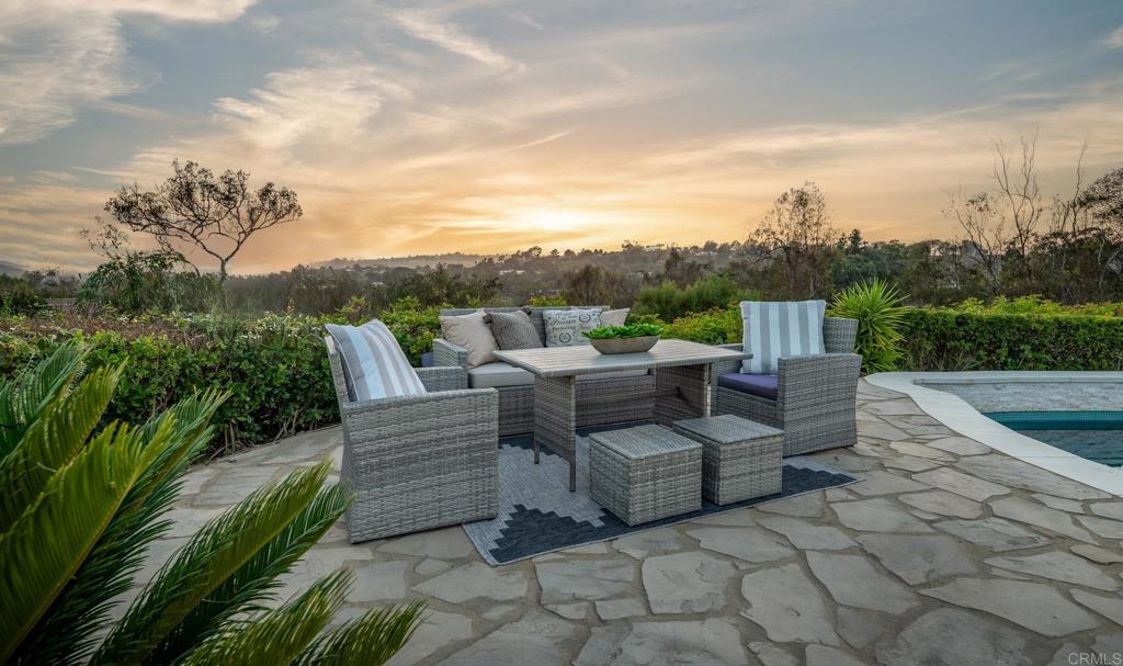 5002 El Acebo Rancho Santa Fe, CA 92067 - Photo 2 of 55 a view of a couches in patio of the house