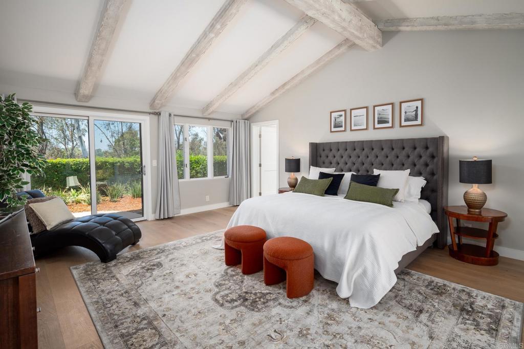 5002 El Acebo Rancho Santa Fe, CA 92067 - Photo 23 of 55 a bedroom with a large bed and a large window