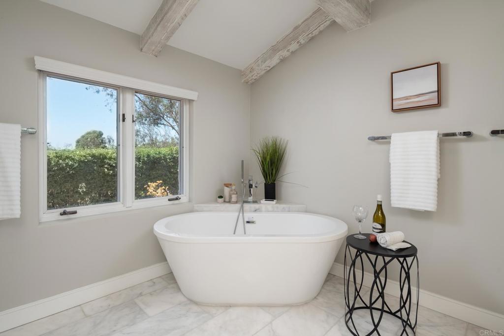 5002 El Acebo Rancho Santa Fe, CA 92067 - Photo 28 of 55 a white tub sitting next to a window