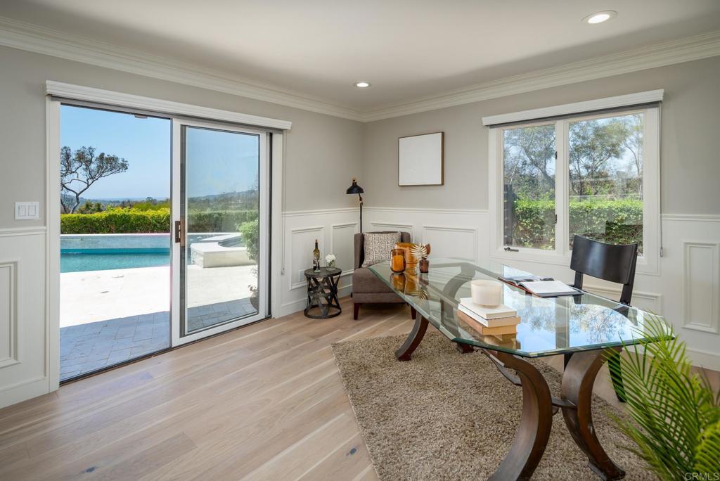 5002 El Acebo Rancho Santa Fe, CA 92067 - Photo 31 of 55 a living room with furniture and a large window