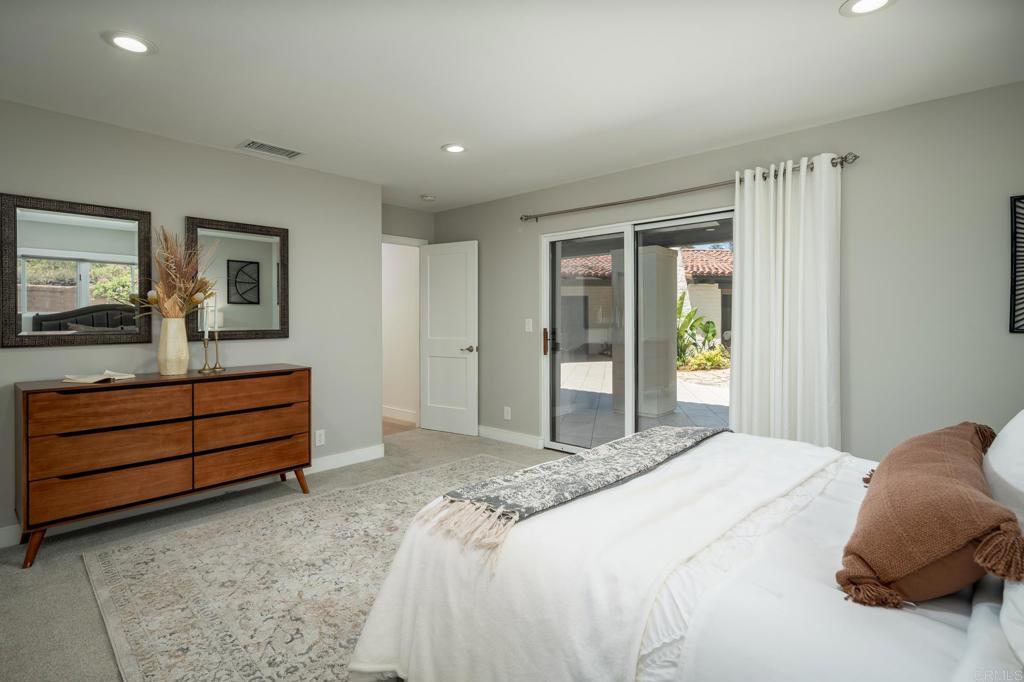 5002 El Acebo Rancho Santa Fe, CA 92067 - Photo 33 of 55 a bedroom with a bed and a dresser