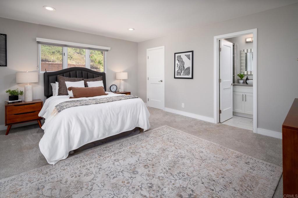 5002 El Acebo Rancho Santa Fe, CA 92067 - Photo 34 of 55 a bedroom with a bed and a large window