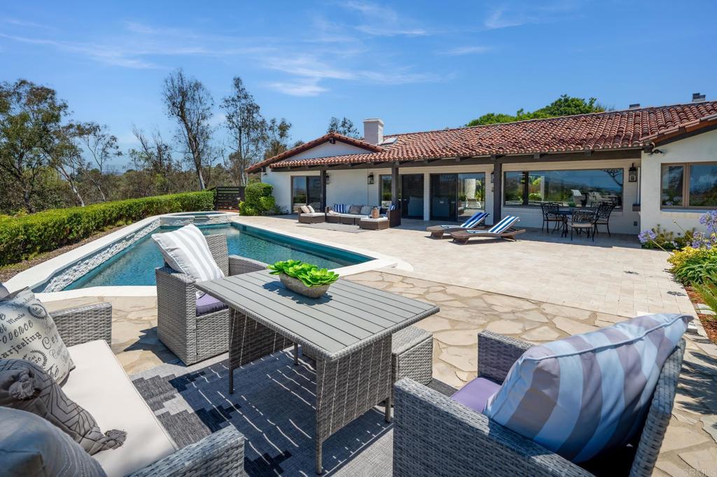 5002 El Acebo Rancho Santa Fe, CA 92067 - Photo 43 of 55 a view of house with outdoor space and sitting area