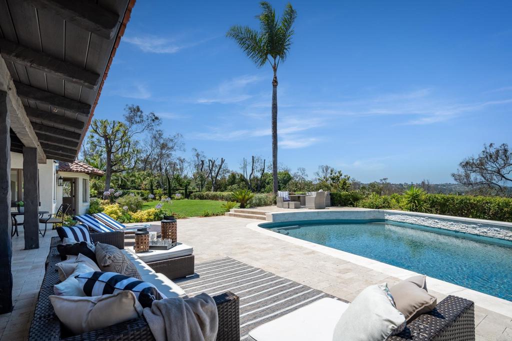 5002 El Acebo Rancho Santa Fe, CA 92067 - Photo 44 of 55 a view of a patio with swimming pool