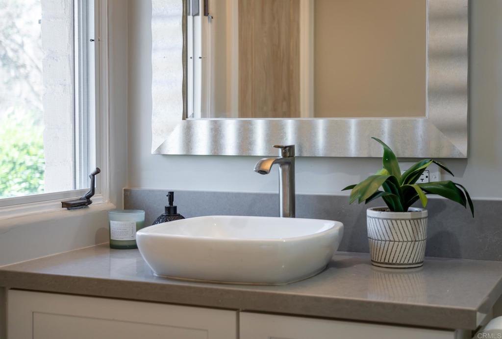 5002 El Acebo Rancho Santa Fe, CA 92067 - Photo 47 of 55 a view of a potted plant sitting in front of a window